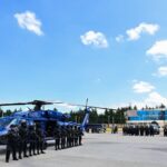 UH-60A Black Hawk de la Policía Estatal del Estado de México en tierra con efectivos formados