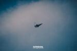 Caza F-35 Lightning II en vuelo con halo de vapor, en fotografía militar de autor