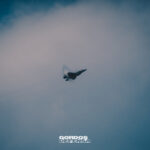 Caza F-35 Lightning II en vuelo con halo de vapor, en fotografía militar de autor