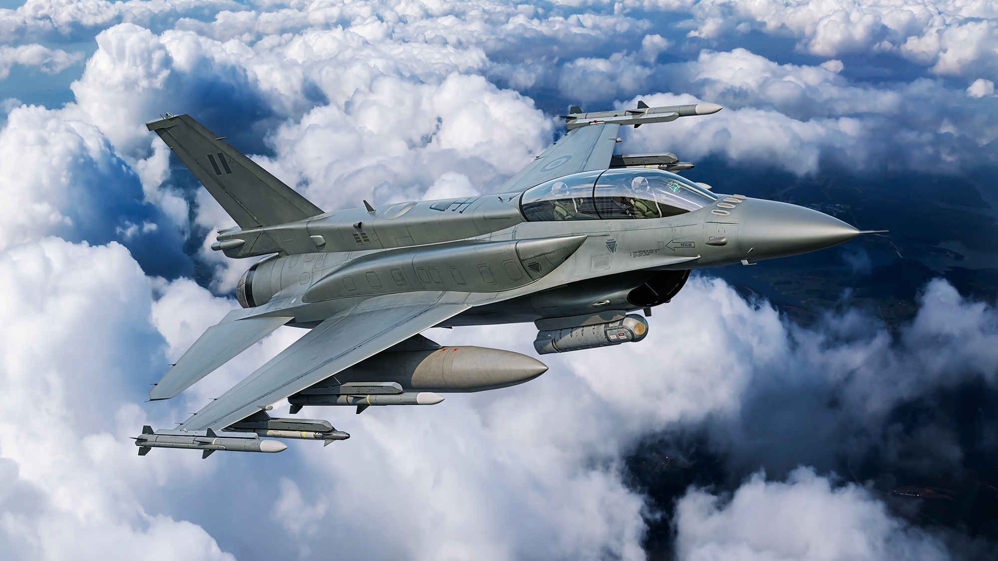 Render de un F-16D Block 70 biplaza en vuelo con distintivos de baja visibilidad